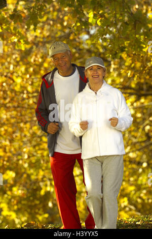 Park, Senior couple, jogging, autumn, 55-65 years, couple, senior citizens, Best Agers, Jung-remaining, jogger, sportsman, partnership, respect, jog, run, sport, running, motion, sportily, fitness, activity, leisure time, hobby, health, conscious health, Stock Photo