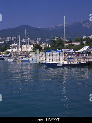 The Ukraine, peninsula the Crimea, Yalta, town view, landing stage, sailing ships, Europe, East, Europe, Respublika Ukraïna, part republic, Republika Krym, south coast, town, port, coastal town, harbour, promenade, quay, ships, yachts, yachts, tourists, t Stock Photo