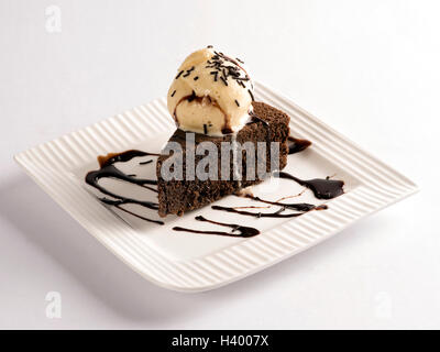 Brownie with vanilla ice-cream served in a small platter Stock Photo