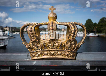 Golden crown on Skeppsholm Bridge, Stockholm, Sweden Stock Photo