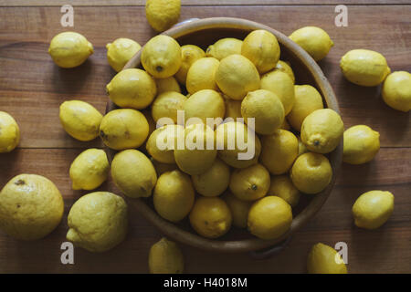Directly above shot of lemons in container on table Stock Photo