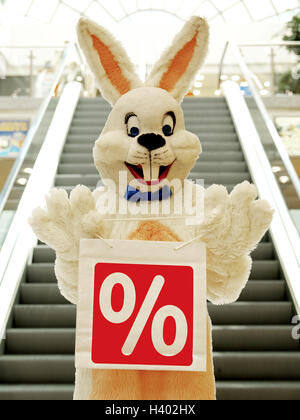 Department store, stairs, Easter bunny, carrier bag, label, percent sign Easter, Easter feast, child's faith, lining, panels, costume, hare's costume, hare, humor, fun, funnily, friendly, happy, joy, inside, purchasing, Easter purchasing, bargain purchase Stock Photo