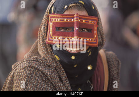 Iran, Bandar e Abbas, woman, veils, portrait, no model release the Near East, locals, Iranian, view camera, veil, Batalu, facial veil, mask, substance mask, red, patterned, Islam, faith, religion, clothes, traditionally, tradition, culture, laugh, happy, Stock Photo