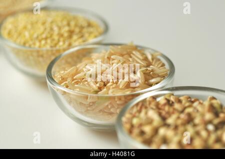 Selection of gluten-free grains in glass bowls top view close-up Stock Photo