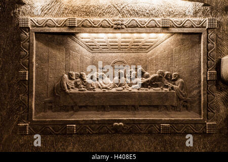 Wieliczka - Poland - April 23. One of the amazing sculptures (The Last Supper) made in salt, located on the side wall of St. Kin Stock Photo