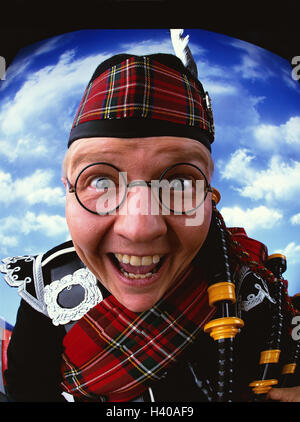 Scot, glasses, facial play, laugh, is surprised, portrait, smile made unfamiliar concepts, Scotland, man, bagpipes, clothes, headgear, checked, tradition, pleases, joy, happy, studio, cloudy sky, wide angle, Stock Photo