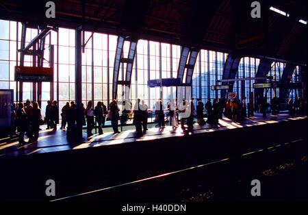 Station hall, window front, platform, passengers, back light, railway station, hall, occupational commuter, travellers, stand, wait, waiting period, train, trajectory, rail transport, traffic, train journey, to train travel, means transportation publicly, railway, transport, transportation human beings, train connection, Germany, Berlin, railway station Alexander's space Stock Photo