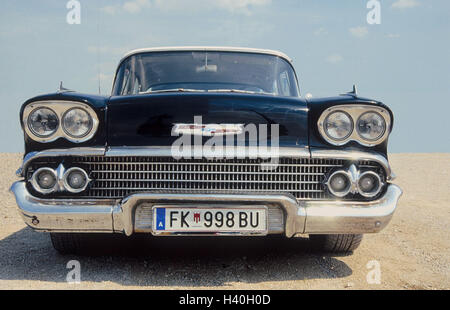 Old-timer, Chevrolet 'impala', year manufacture in 1958, front view only editorially car, passenger car, vehicle, black, old, nostalgically, nostalgia, cultivated, collector's item, collector's object, collector's item, luxury, valuably, status symbol, we Stock Photo