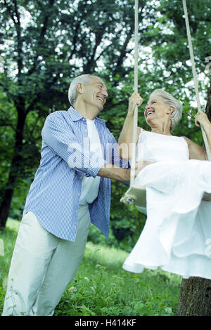 Garden, swing, Senior couple, happy, eye contact, couple, senior citizens, Best Age, happy, lighthearted, carefree nature, joy life, activity, actively, fit, actively, garden swing, swing, swing, bowl first, fun, amusement, enterprising, smile, smile young remaining, harmony, luck, eye contact, affectionately, fallen in love, love, together, leisure time, summer, outside Stock Photo