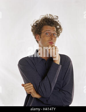 Man, young, glasses, gesture, thoughtful, doubtful, arrogantly, half portrait, Men, hairs, wavy, curls, blond, studio, cut out, pride, forehead, folds, arrogance, arrogance, haughty, self-confidently, haughtily, arrogance, self-confidence, scepticism, Stock Photo