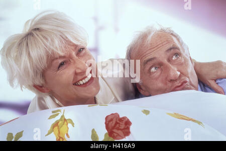 Senior couple, bed, laugh, sleep, happy, facial play Senior, inside, at home, senior citizens, couple, man, woman, old, pensioner's married couple, married couple, married couples, wake up, wake together, with each other, humorously, time day, morning, in the morning, smile, bedroom, Stock Photo