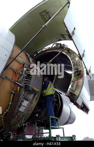 Airport grounds, airplane, detail, engine, worker, maintenance, no ...