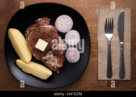 raw pork steak still life wooden background prepare food rustic cooking herbs Stock Photo