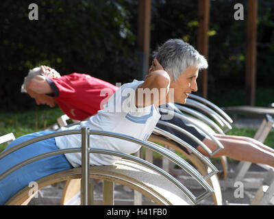 keep-fit trail, senior citizens, training device, abdominal position, exercises, abdominal musculature, 50-60 years, people, Senior couple, couple, sportily, sport, activity, gymnastics, gymnastics practise, practise, health, fitness, body, mind, soul, tr Stock Photo