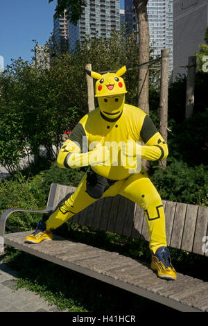 A 34 year old young man dressed as Pokemon at the 20166 COMICON in Manhattan, New York City. Stock Photo