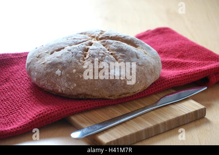 Fresh loaf of whole-wheat flour. Stock Photo