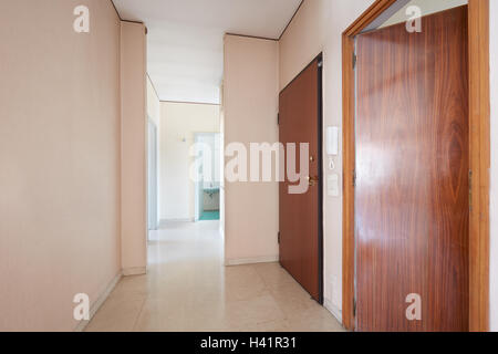 Corridor in empty apartment with marble floor, perspective Stock Photo