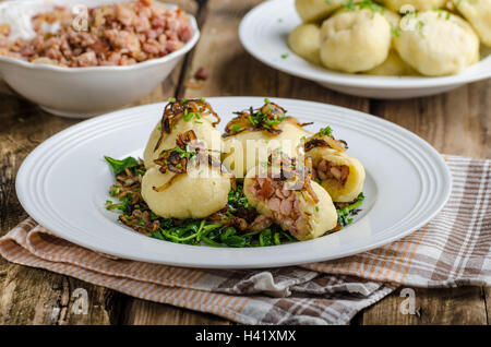 Potato dumplings stuffed with smoked meat, czech original meal, very unhealthy, but delicious Stock Photo