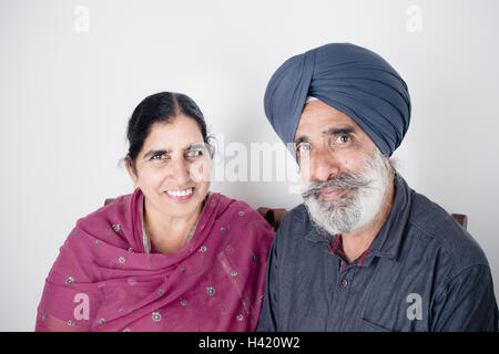 Portrait of smiling Indian couple Stock Photo