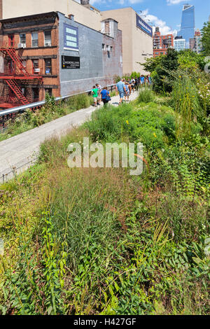 Pedestrians walk on High Line Park in the New York City borough of ...