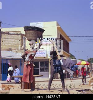 Senegal, to bass Casamance, Cap Skirring, town view, Diola monument, passer-by, Africa, West, Africa, lower Casamance, Senegal, to bass Casamance, Cap Skirring, town, street scene, street, shops, shops, sculpture, monument, ethnic group, tribe Diola, Diola couple, icon, art, typically, traditionally, people, Senegaleses, swarthy, Stock Photo