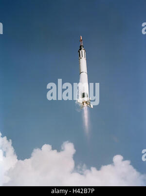The Mercury Redstone capsule carrying NASA astronaut Alan Shepard and the Freedom 7 spacecraft blasts off from the launch pad May 5, 1961 in Cape Canaveral, Florida. The flight marked the first time an American flew into space. Stock Photo