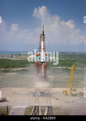 The Mercury Redstone rocket capsule launches the Freedom 7 spacecraft into space carrying astronaut Alan Shepard from the Launch Complex at the Cape Canaveral Air Force Station May 5, 1961 in Cape Canaveral, Florida. Freedom 7 was the first piloted suborbital spaceflight, making Shepard the first American in space. Stock Photo