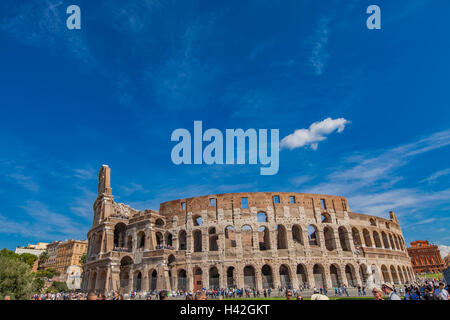 ROME, ITALY - SEPTEMBER 24, 2016: Unidentified people by Colosseum in Rome, Italy. It was opened at 80AD and is the largest amph Stock Photo