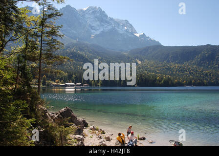 Germany, Bavaria, Zugspitze, cable car, Eibsee, shore, people, Upper Bavaria, Werdenfels, mountains, alps, mountain, summit, snow, mountaintop, 2.962 m, trajectory, mountain railway, Eibsee cable car, ropes, lake, mountain lake, lakeside, boathouses, nature, person, walk, family, Stock Photo