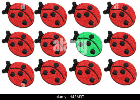 Ladybug shaped patches against white background Stock Photo