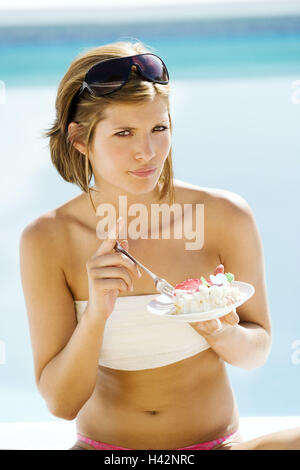 Woman, sit young, brunette, pool, enjoy, cakes, model released, Stock Photo