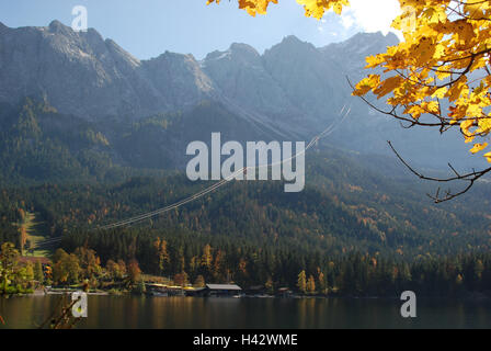 Germany, Bavaria, Werdenfels, Eibsee, mountains, cable car, Zugspitze, autumn, Upper Bavaria, alps, weather stone, Wetterstein Range, mountains, mountain massif, mountain landscape, waters, lake, mountain lake, Alpine lake, Eibsee cable car, autumn scenery, scenery, wood, autumn staining, autumnally, season, nobody, means transportation, destination, tourism, nature, Stock Photo