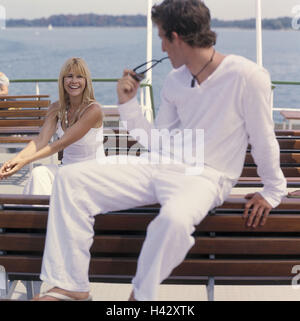 Excursion boat, deck, saddles, couple, flirtation, eye contact, vacation, leisure time, boat tour, boat trip, woman, man, clothes white, flirt, happy, joy, holiday flirtation, get to know, smile, positive mood, outside Stock Photo