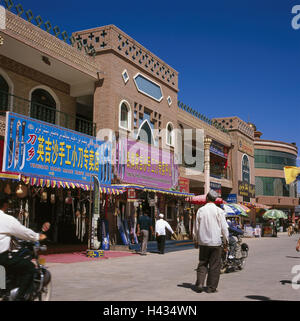 China, region Sinkiang, Framing-even, Id Kah Mosque Square, souvenir shops, passers-by, Asia, Silk Road, Xinjiang, Kashi, town view, town, city centre, Straßenzene, building, market, bazaar, shops, shops, trade, sales, souvenirs, souvenir sales, person, outside, Stock Photo