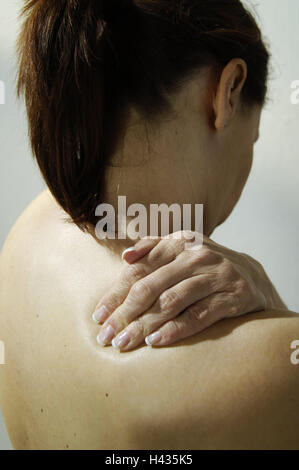 Woman, gesture, back pains, back view, curled, people, brunette, health, disease, patient, complaints, pains, touch, hand, nape, nape range, shoulder, shoulder range, spanning, Stock Photo