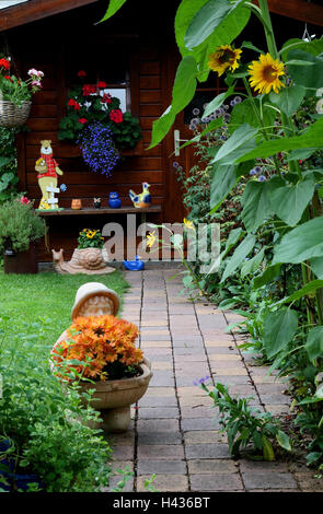 Summer house with flowers in summer, Stock Photo