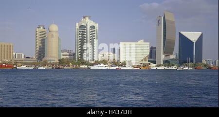 United Arab Emirates, Dubai, Dubai Creek, skyline, VAE, town, Dhauhafen, harbour, channel, high rises, skyscrapers, buildings, office buildings, banks, national bank, architecture, modern, places interest, waters, channel, ships, yachts, tourism, attraction, sunlight, deserted, panorama, Stock Photo