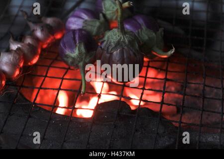 Eggplant Grill on wood fire. Stock Photo