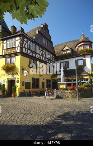 Germany, Rhineland-Palatinate, Cochem, Old Town, hotel old Thorschenke, Moselle valley, wine regions, wine-growing area, tourism, destination, place of interest, building, hotel, hotel building, historically, architecture, half-timbered, old, outside, gable, cafe, street cafe, deserted, summer, sunny, Stock Photo