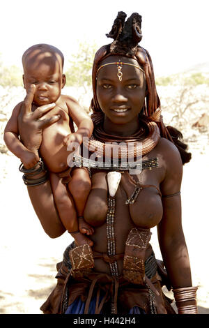 Namibia, Damaraland, Himba people, mother, child, holding, half portrait, Stock Photo