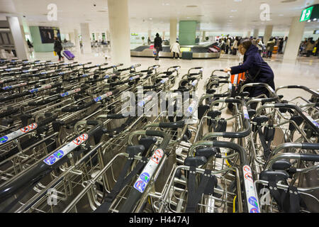 Spain, Catalonia, Barcelona, airport, luggage car, tourist, Stock Photo