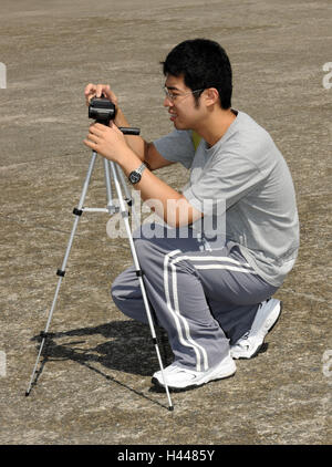 Man, Asian, young, camera, tripod, Stock Photo