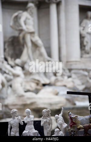 Italy, Rome, souvenir sales, figures, Fontana di Trevi, background blur, Stock Photo