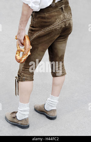 Man, bottom, buttocks, lederhosen, pretzel, legs, calves, Haferlschuhe, traditional dress, detail, Oktoberfest, Munich, Bavaria, Germany, Stock Photo