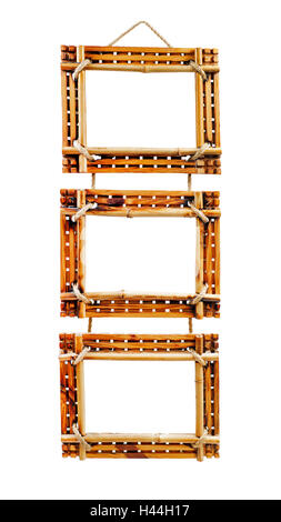 Three bamboo photo frames isolated on white background. Closeup. Stock Photo