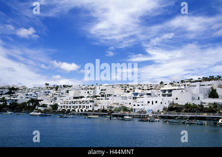 Spain, the Canaries, island Lanzarote, Puerto del Carmen, fishing harbour, houses, town view, Stock Photo