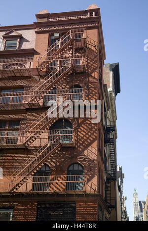 The USA, New York city, SoHo, corner house, fire escapes, North America, part town, brick building, building, outside, to conductors, escape route, nobody, Stock Photo