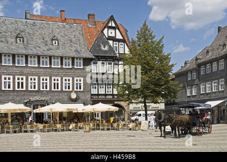 Germany, Lower Saxony, Harz, Goslar, marketplace, houses, slate houses, cafe, horse's carriage, Stock Photo