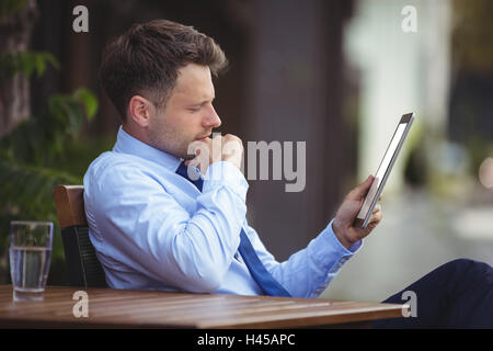 Businessman using digital tablet Stock Photo