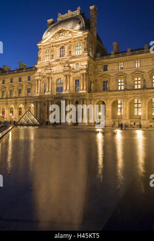 France, Paris, Musee du Louvre, glass pyramid, water pool, lighting, evening, Stock Photo